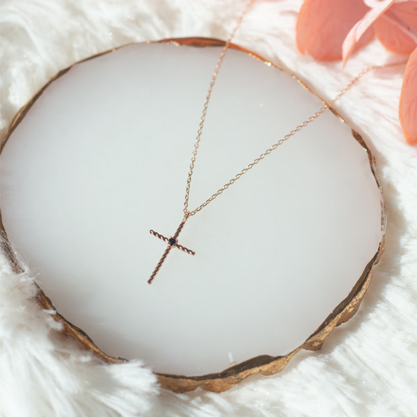 Twisted cross pink gold necklace